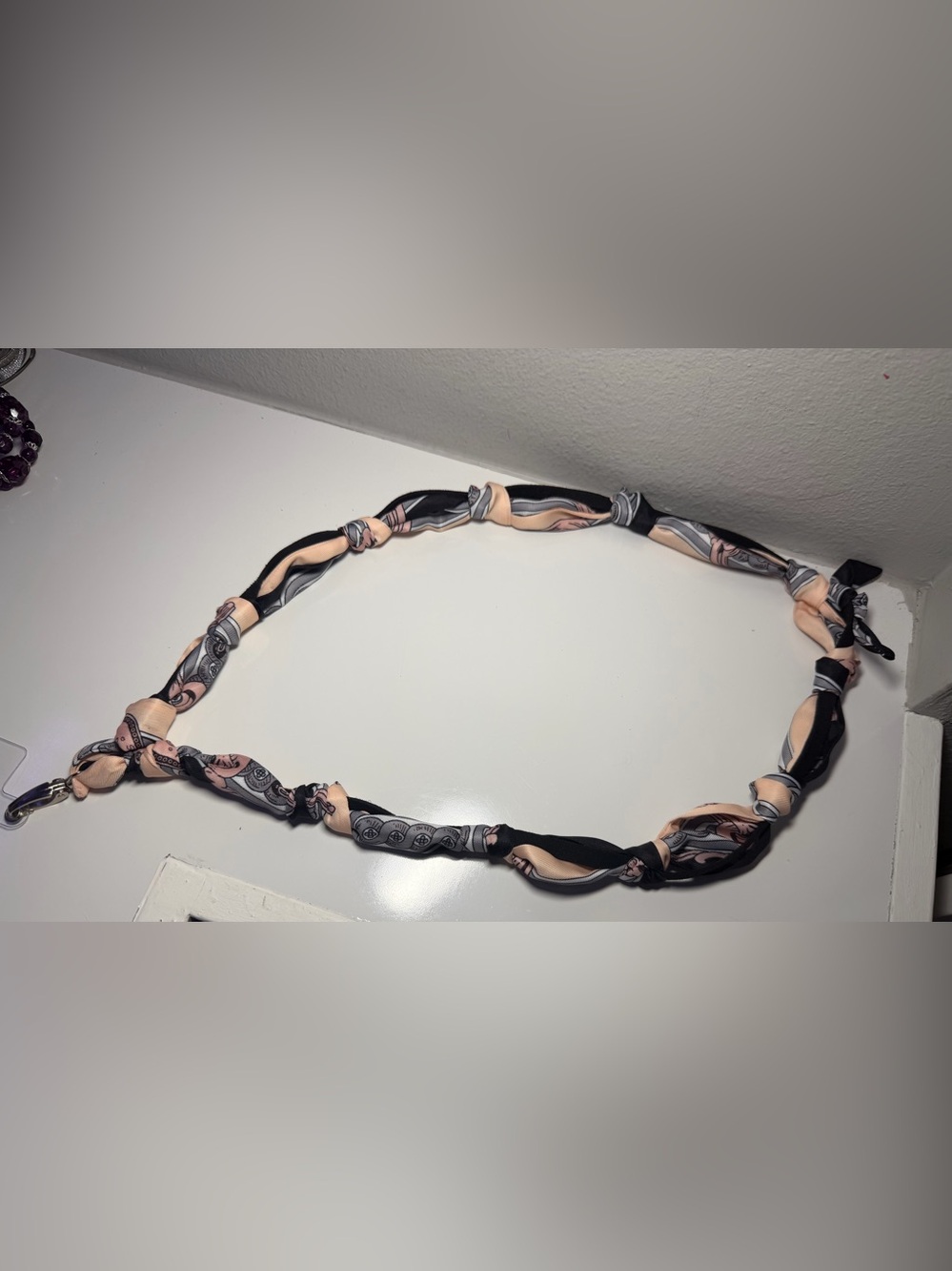 Silk-Twilly Pink and Black tied onto a leather lanyard holder/cell phone cord. - Picture 7 of 12